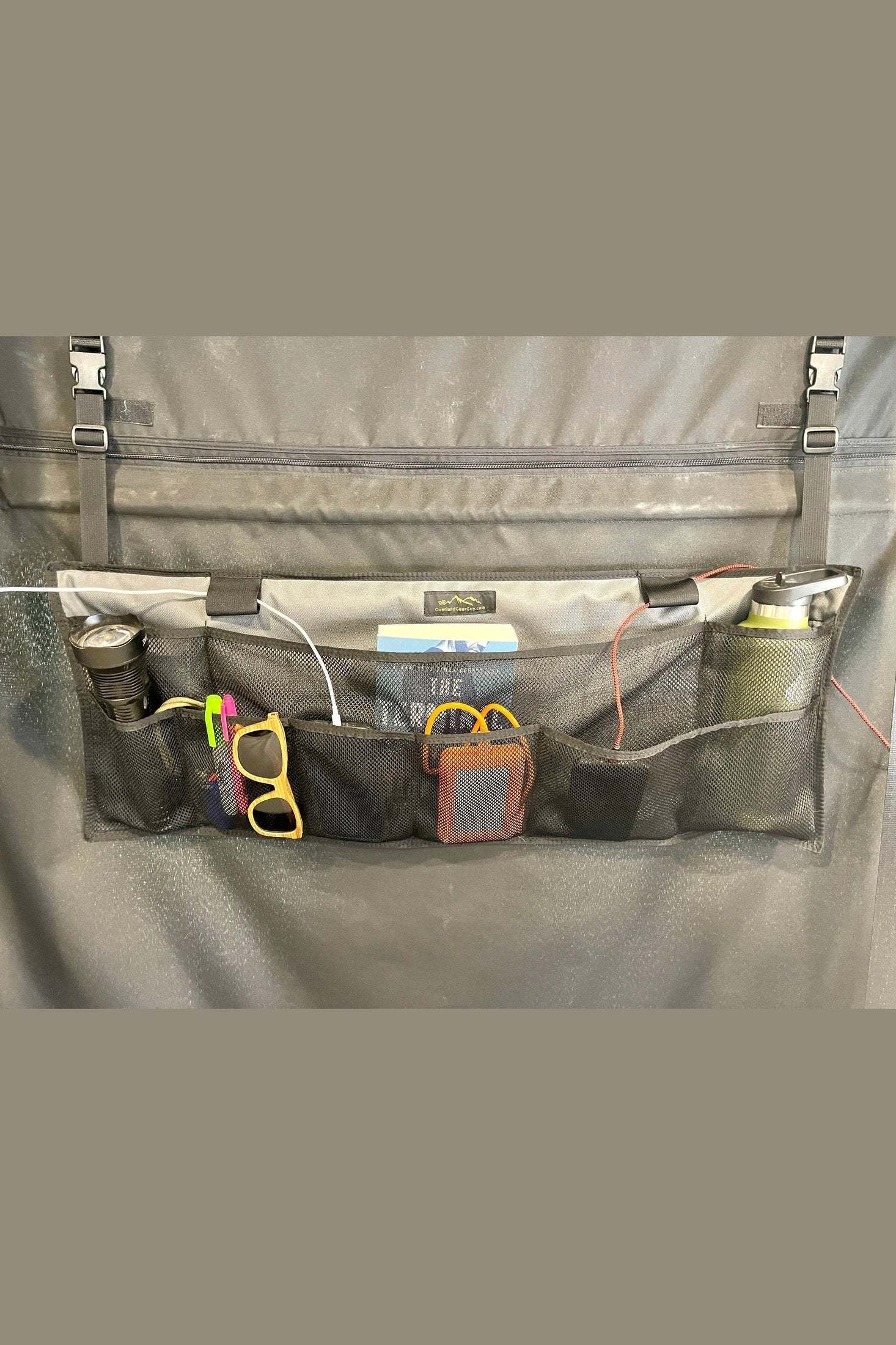 Revel Van Rear Storage Organizer with eight mesh pockets for organizing van essentials, designed to attach to ROLEF Screen.