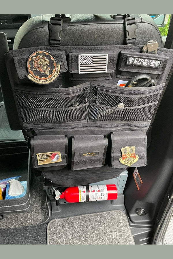 Adventure Ready 2 Seat Organizer with multiple pockets and durable black fabric attached to vehicle seat back