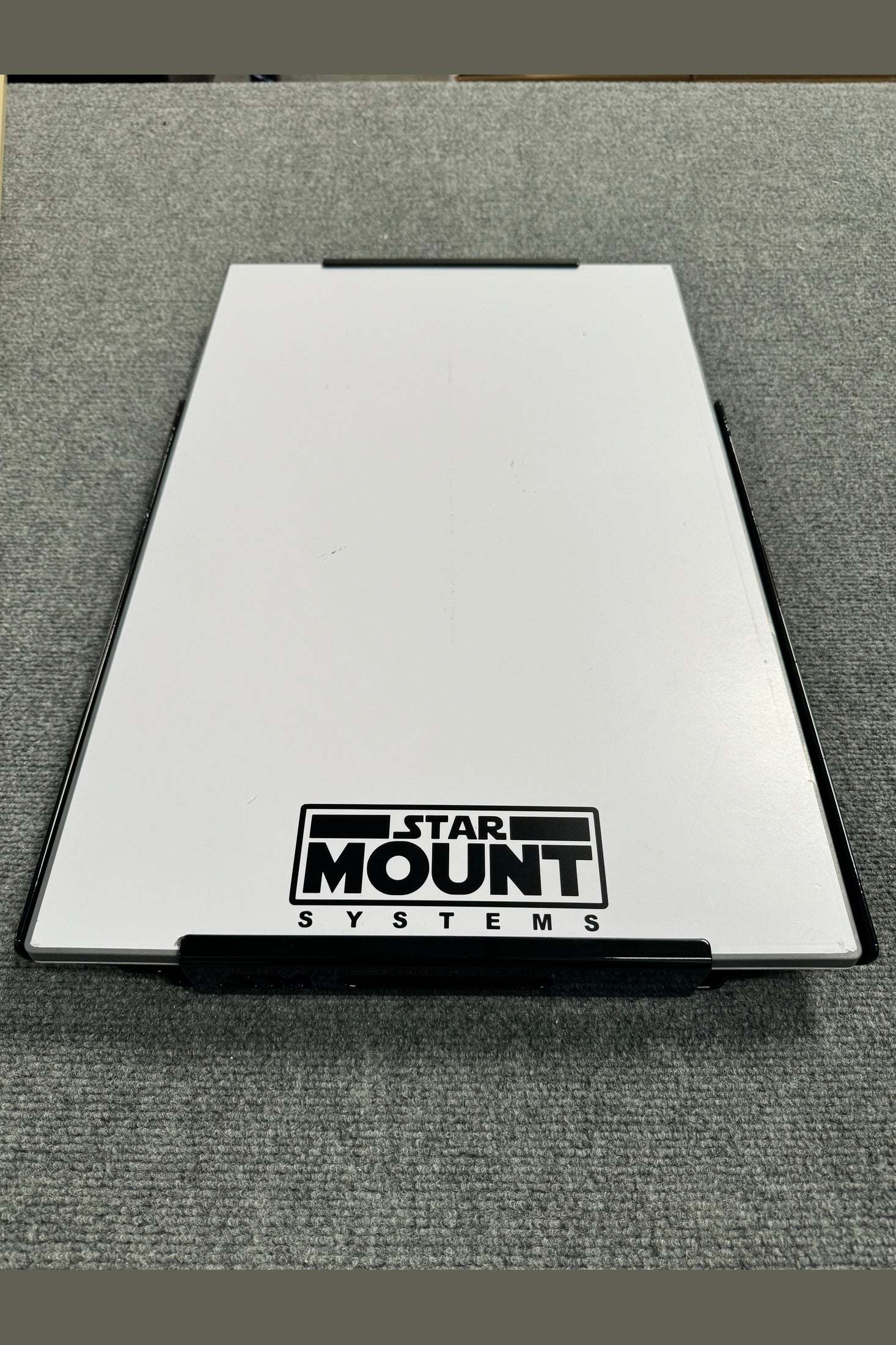 Star-Mount Explorer Mount for Gen 3 Starlink on a gray surface with Star-Mount Systems logo.