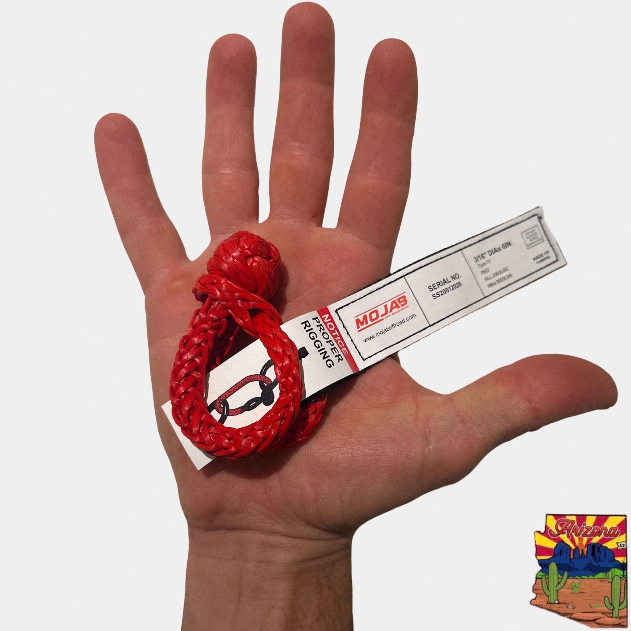 Micro Soft Shackle 3/16'' x 6'' in red shown on hand, durable and compact keychain recovery tool with lifetime warranty