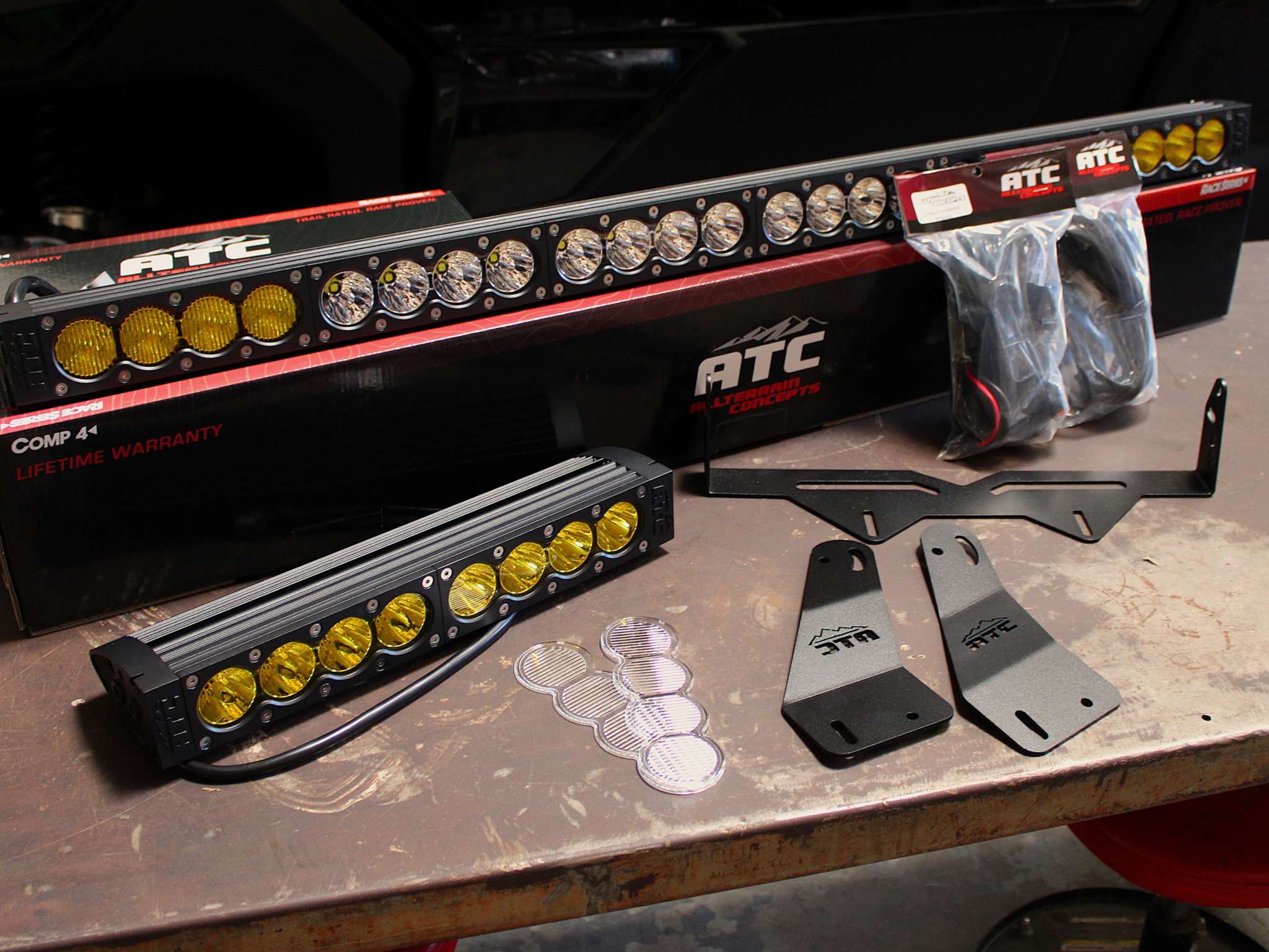 ATC COMP 4 Kit with LED light bars, wiring harnesses, shock mount bracket, and race top bracket for Can-Am X3 off-road vehicles
