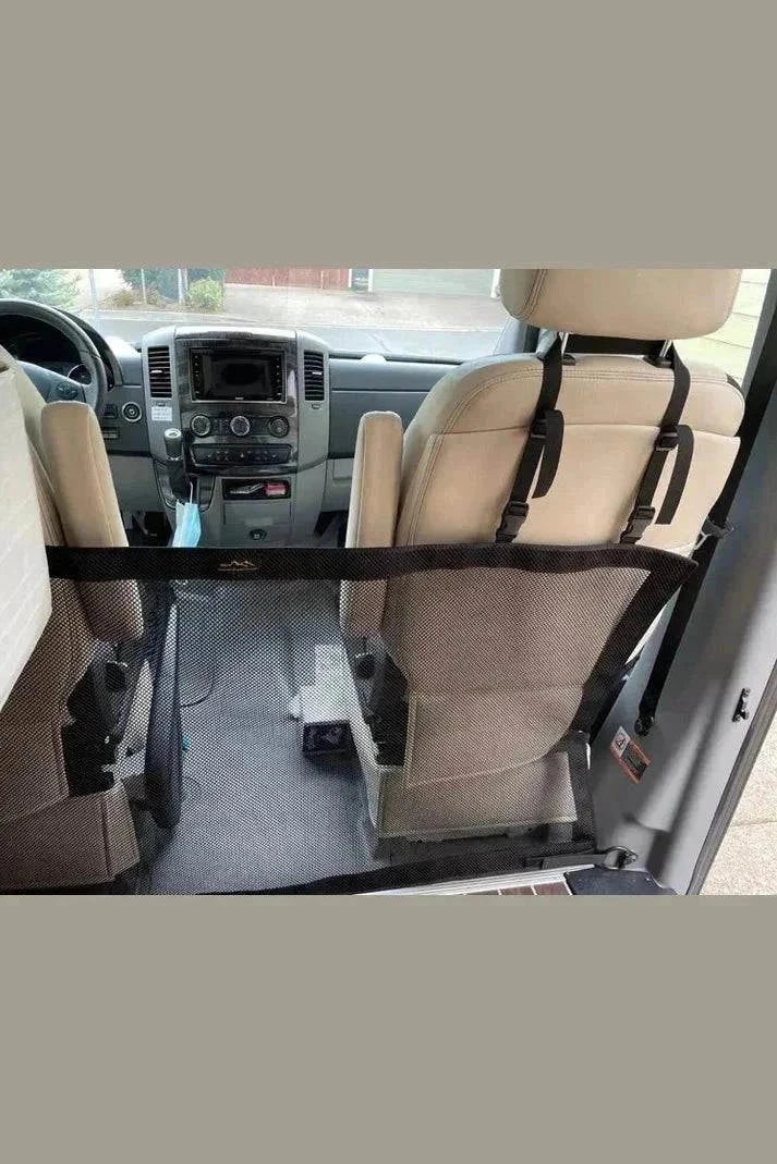 Sprinter Van Dog Barrier mesh installed between front seats to secure pets inside van