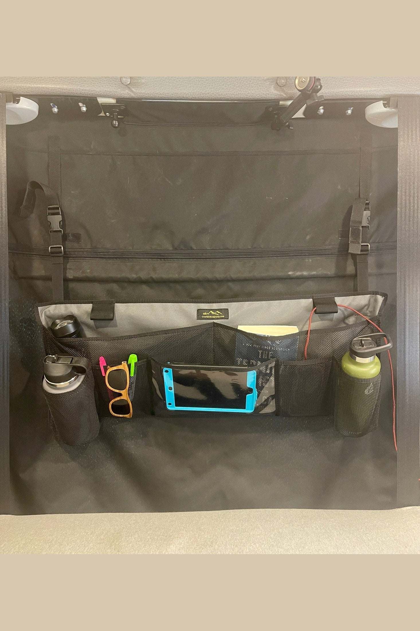 Revel Van Rear Storage Organizer with multiple mesh pockets and iPad pouch for vehicle rear storage