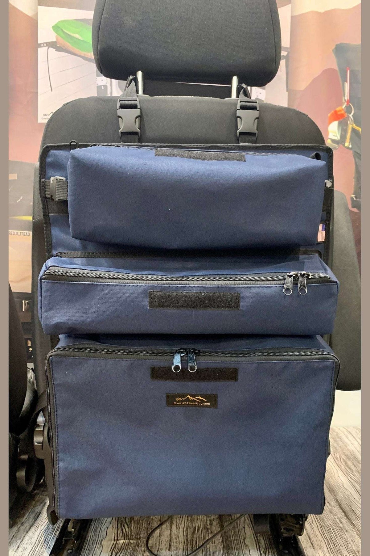 Arches Overlander 1 Seat Organizer on vehicle seat with spacious pockets and durable construction.