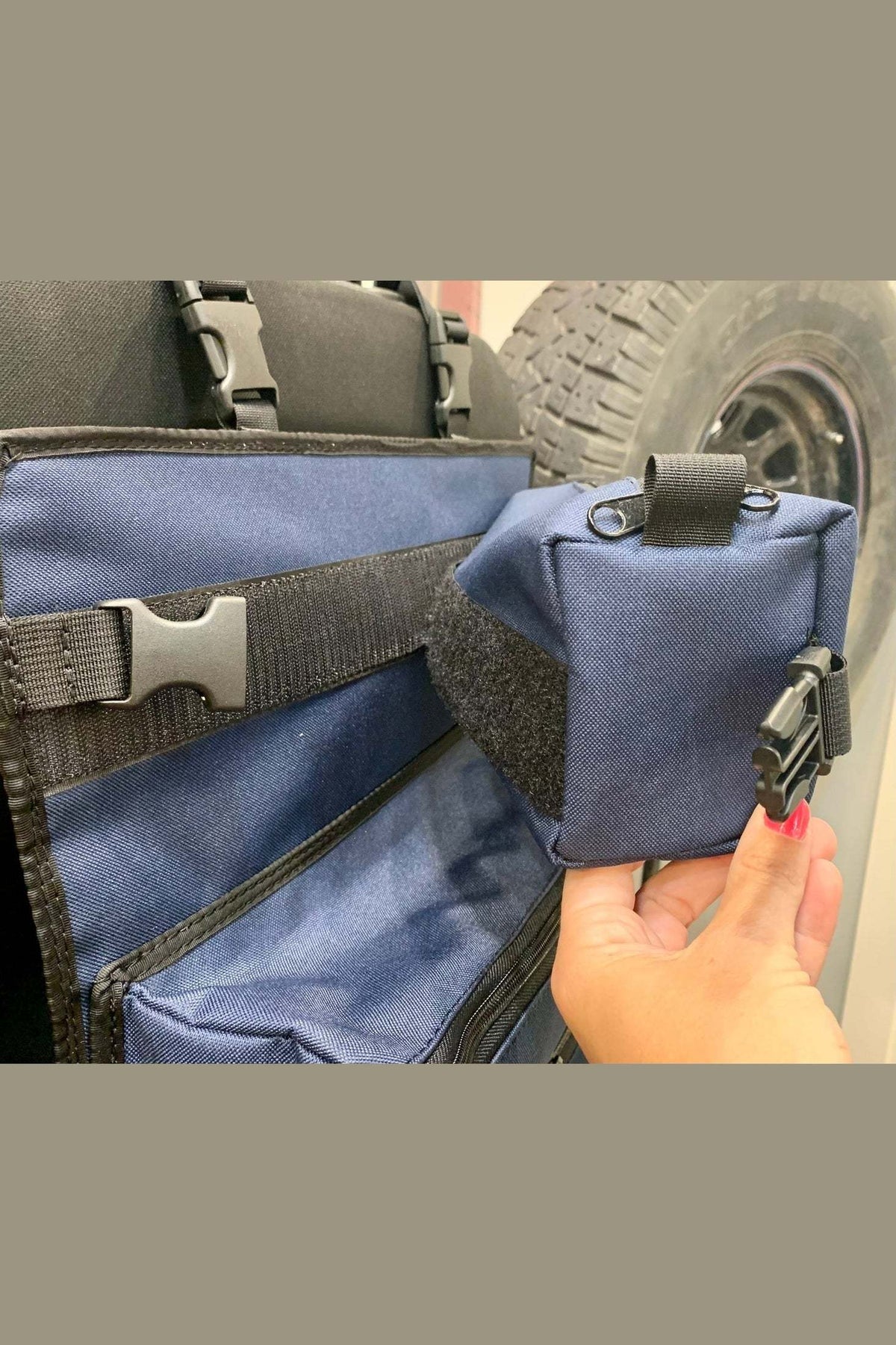 Arches Overlander 1 Seat Organizer with detachable pocket in vehicle.
