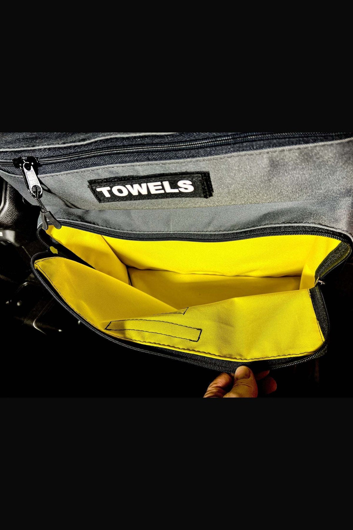 Arches Overlander 1 Seat Organizer with spacious yellow interior pockets and towel storage.