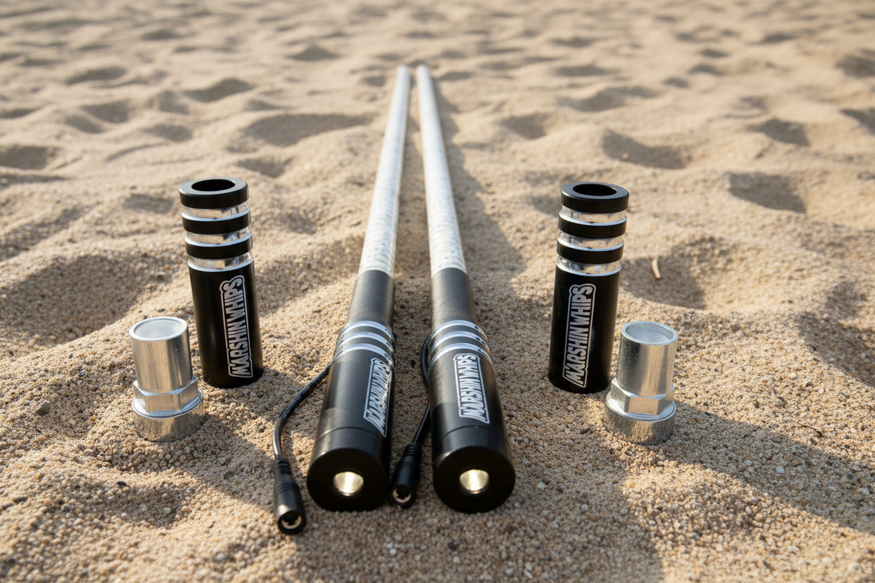 Game Changer red white blue off-road whip set with LED lights and magnetic base on sand