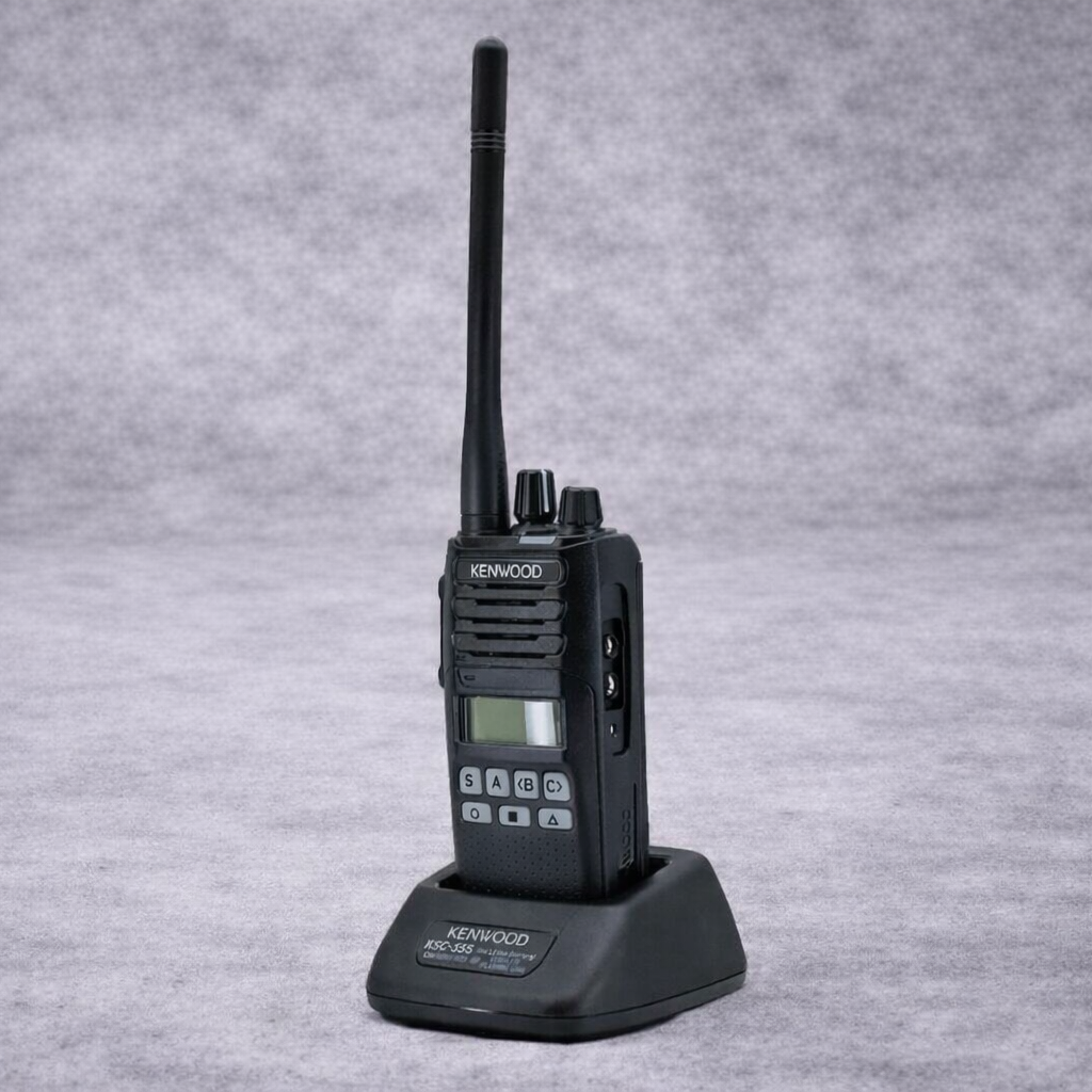 Kenwood NX-1300 handheld UHF radio with alphanumeric display and charger on clearance