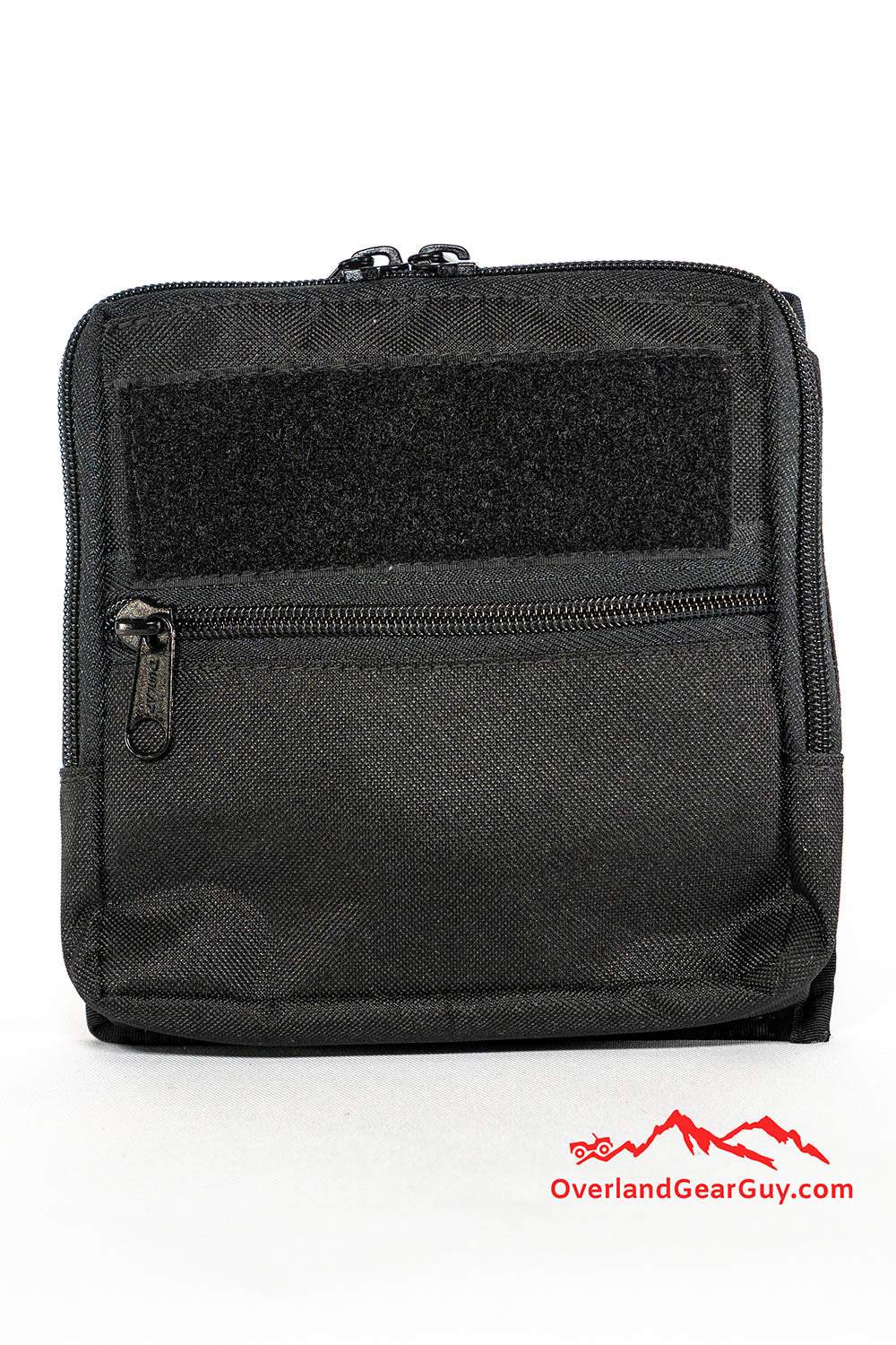 Compact black MOLLE Utility Pocket with zipper and Velcro loop for gear organization and attachment.