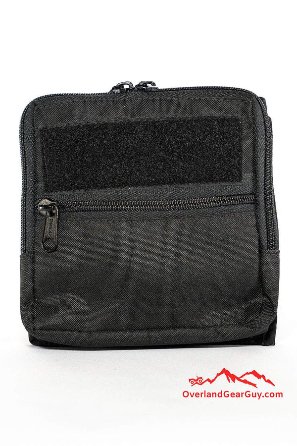 Compact black MOLLE Utility Pocket with zipper and Velcro loop for gear organization and attachment.