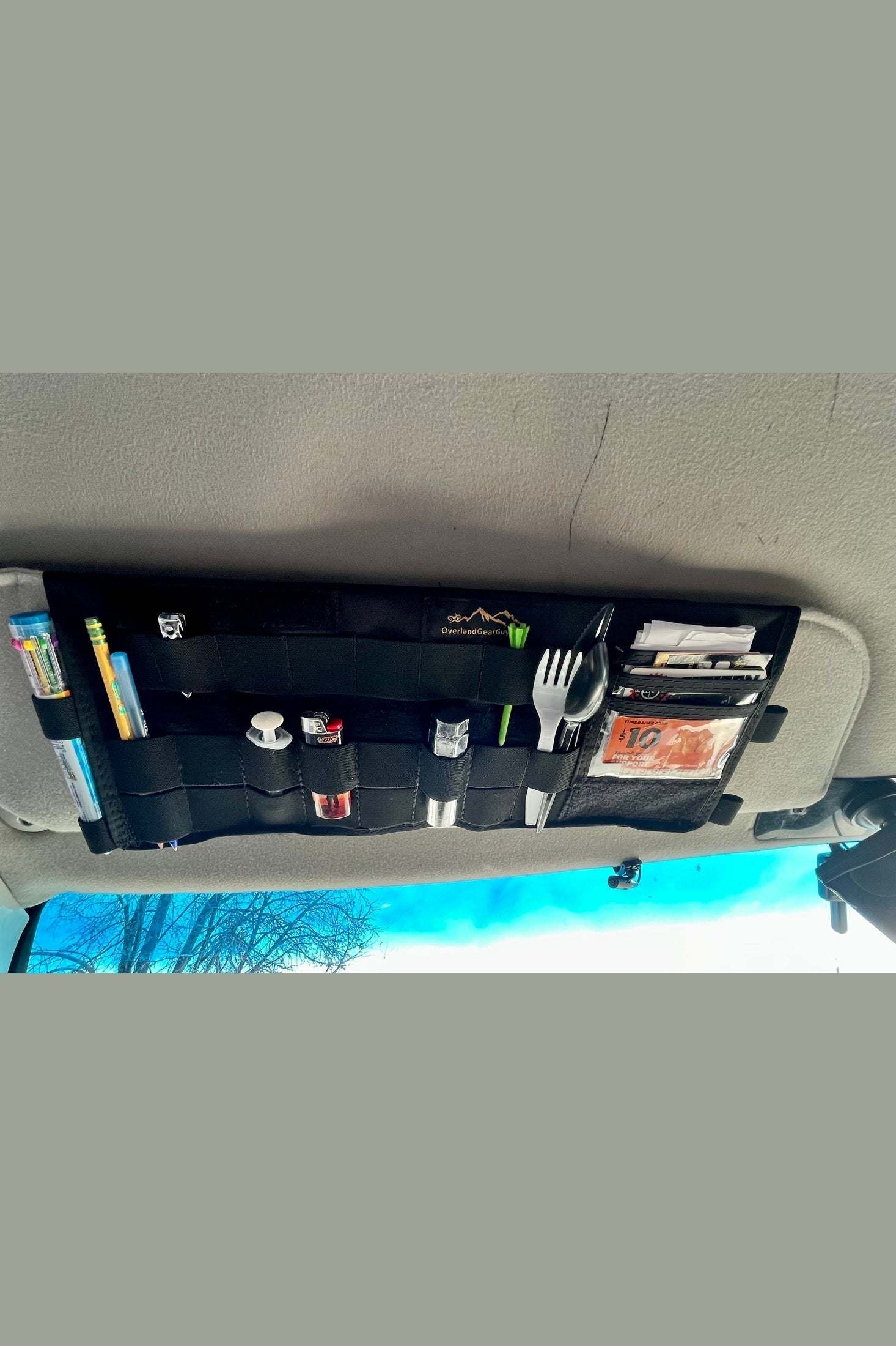 Ford Econoline Van sun visor organizer with multiple compartments for storing essentials and easy installation with Velcro