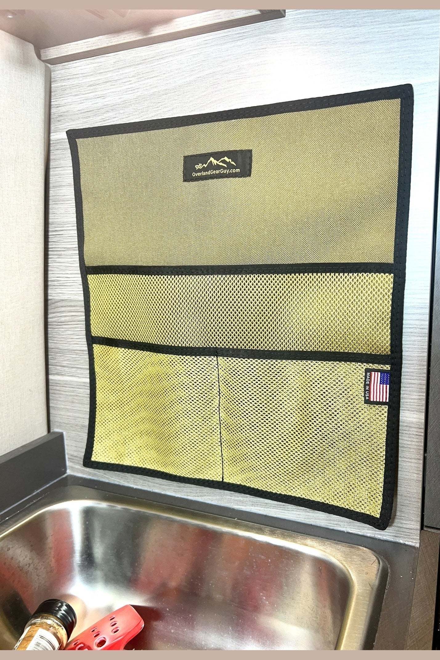 Jayco - Entegra Kitchen Storage Sleeve hanging on van wall above sink for utensil and spice organization