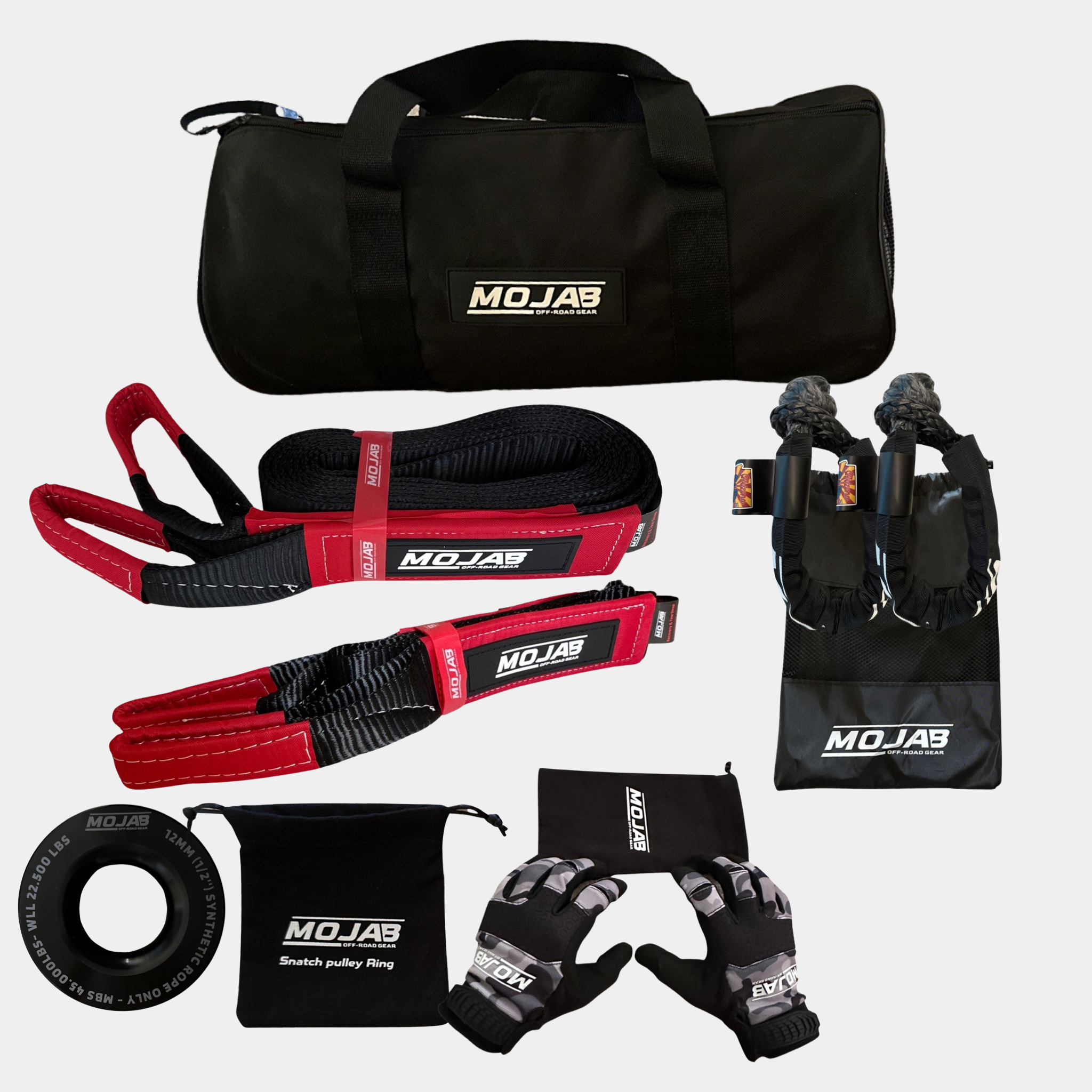 Essential off-road recovery kit with gloves, snatch ring, soft shackles, tow straps, and storage bags