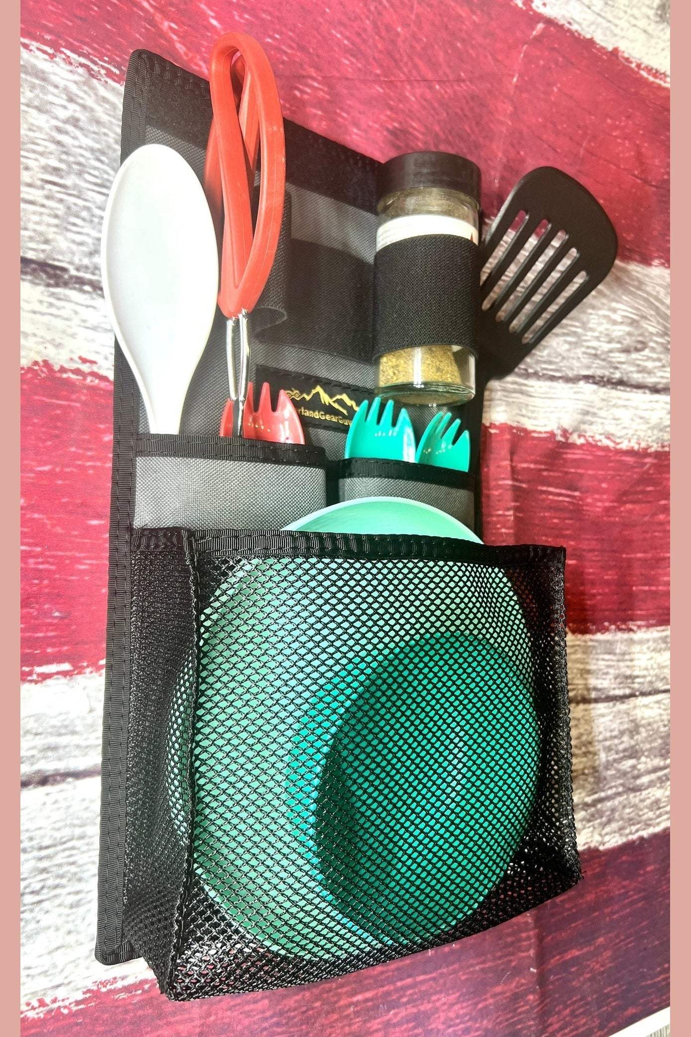 Four Wheel Campers single kitchen organizer with utensils and mesh pocket for plates