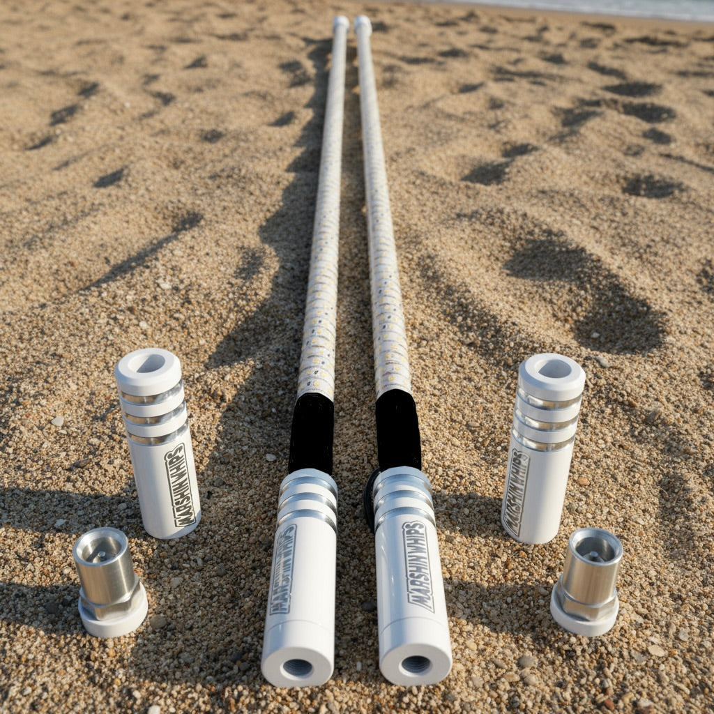 Game Changer White Edition off-road LED whip antennas with magnetic bases on sand