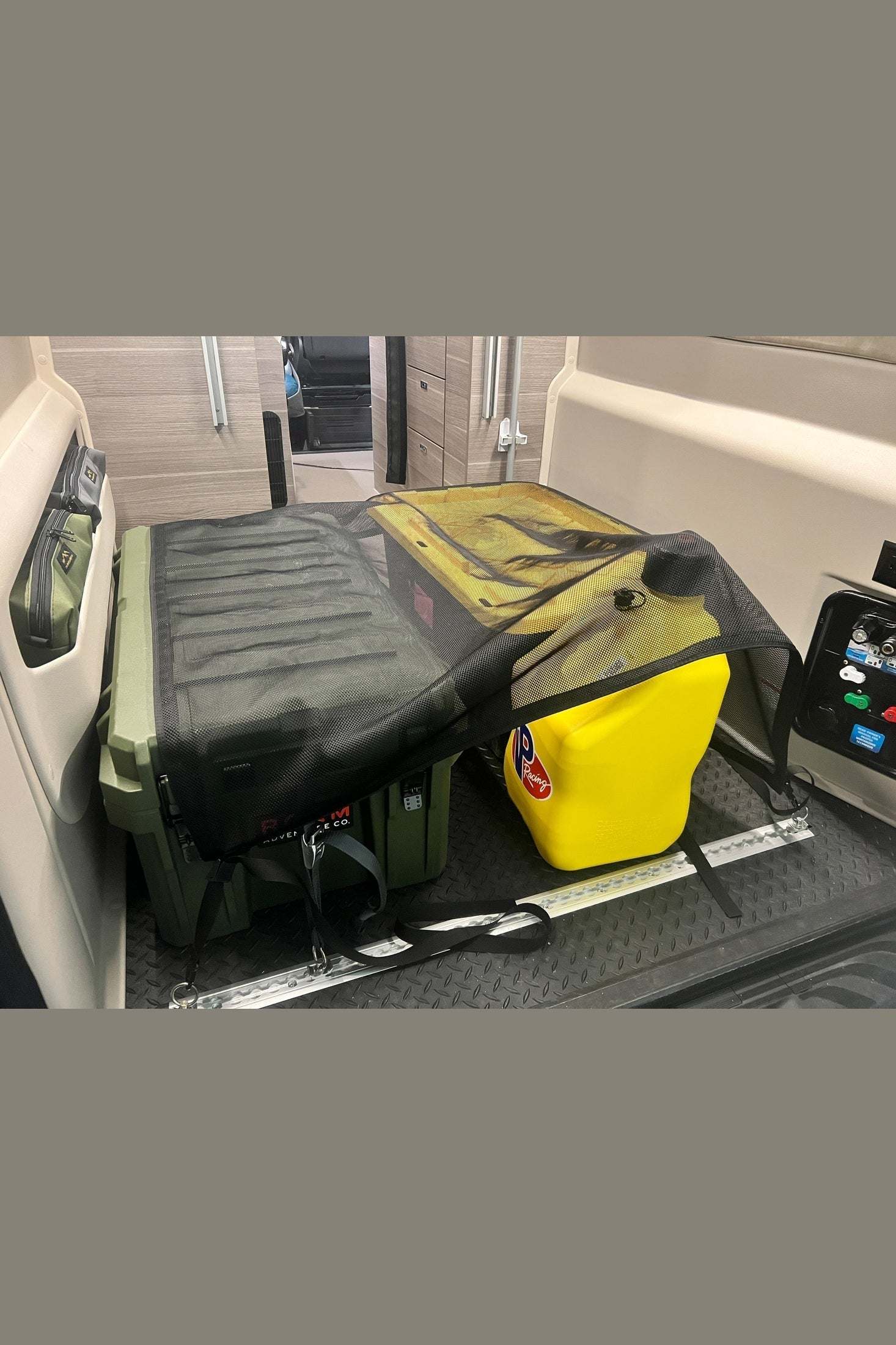 Jayco Entegra Cargo Net securing gear in van storage area