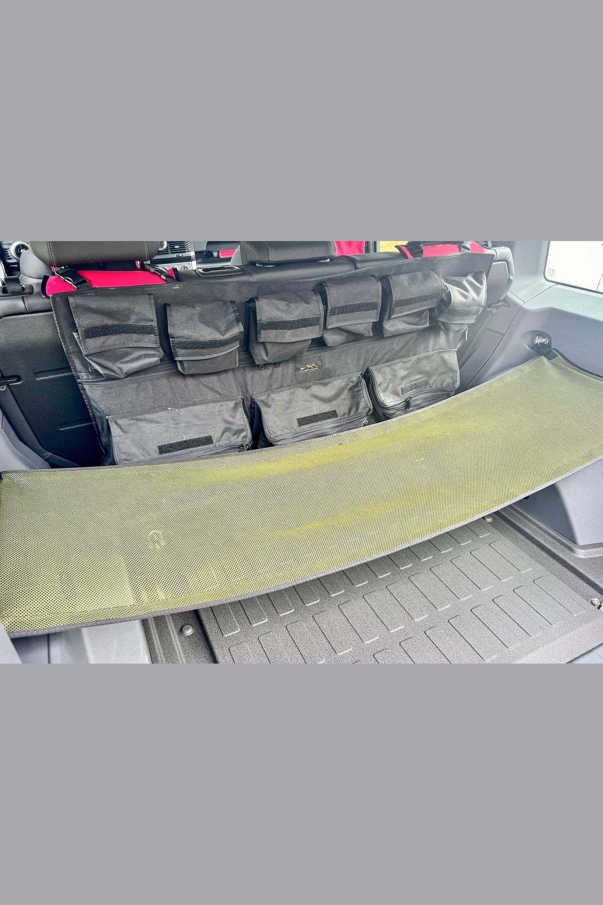 Organize Your Gear with INEOS Grenadier Cargo Nets - Keep Your Vehicle Tidy and Ready for Adventure