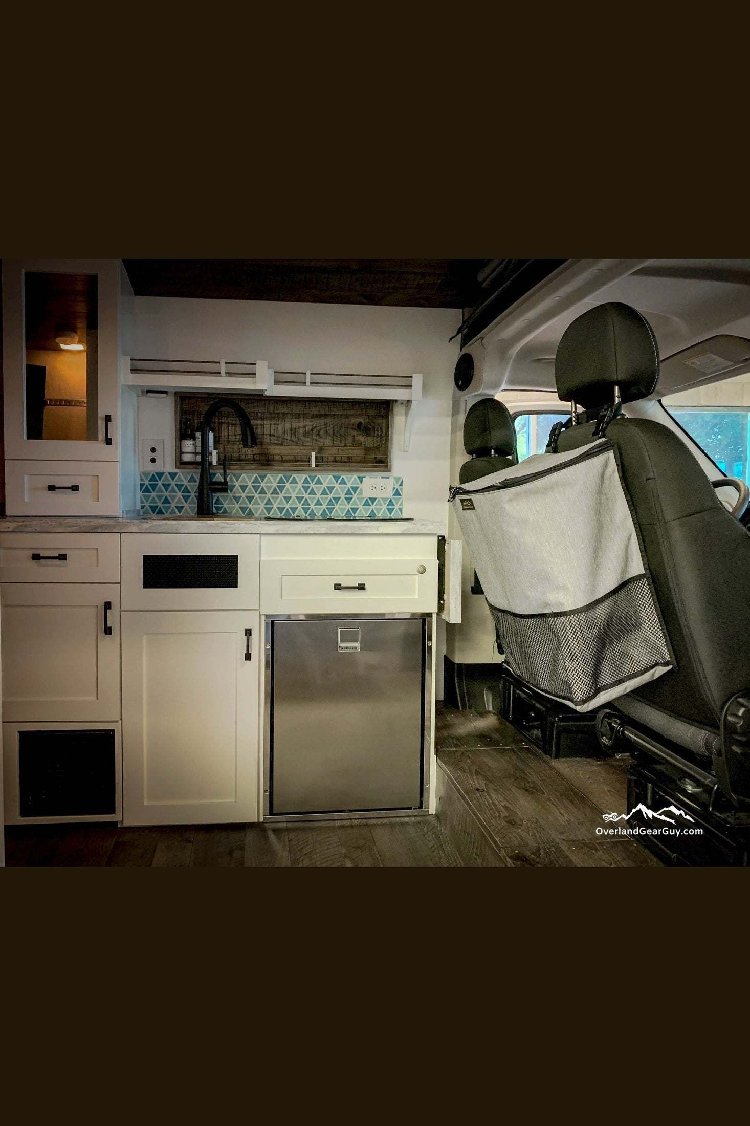 Large Headrest Trash Bag attached to vehicle seat for organized storage and waste disposal during trips