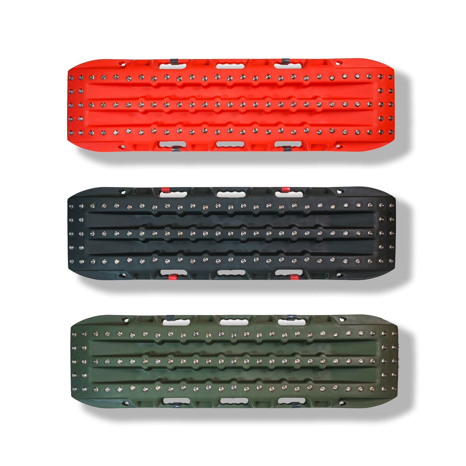 Ultimate traction recovery boards with steel plugs in red, black, and green for off-road vehicle traction and recovery.