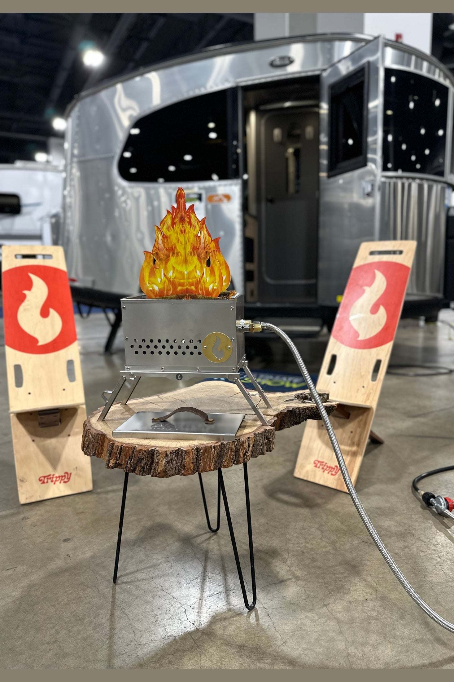 RV Quick Connect Hose with flame, showcasing convenient RV connection setup.