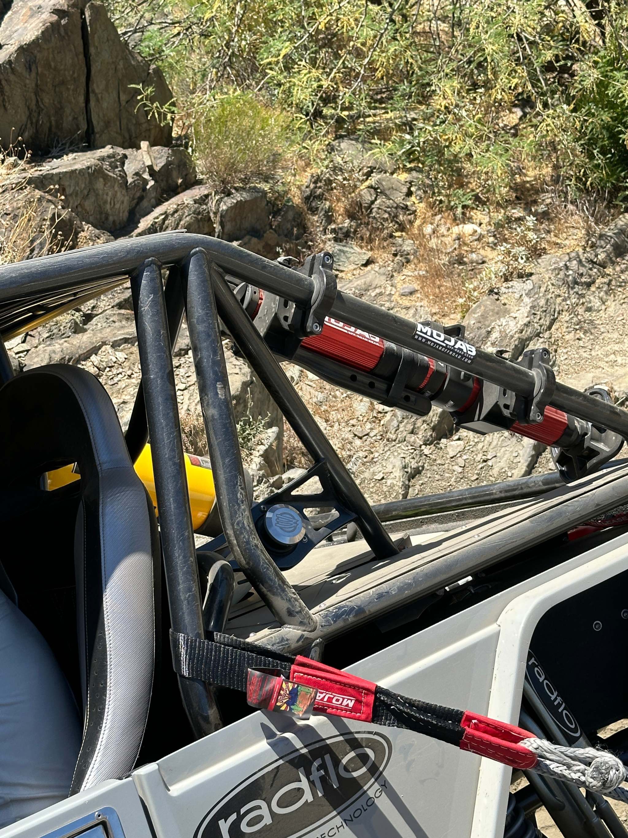 Short durable 2 inch by 4 foot nylon winch strap with storage bag and Velcro straps for off-road vehicle recovery and repairs