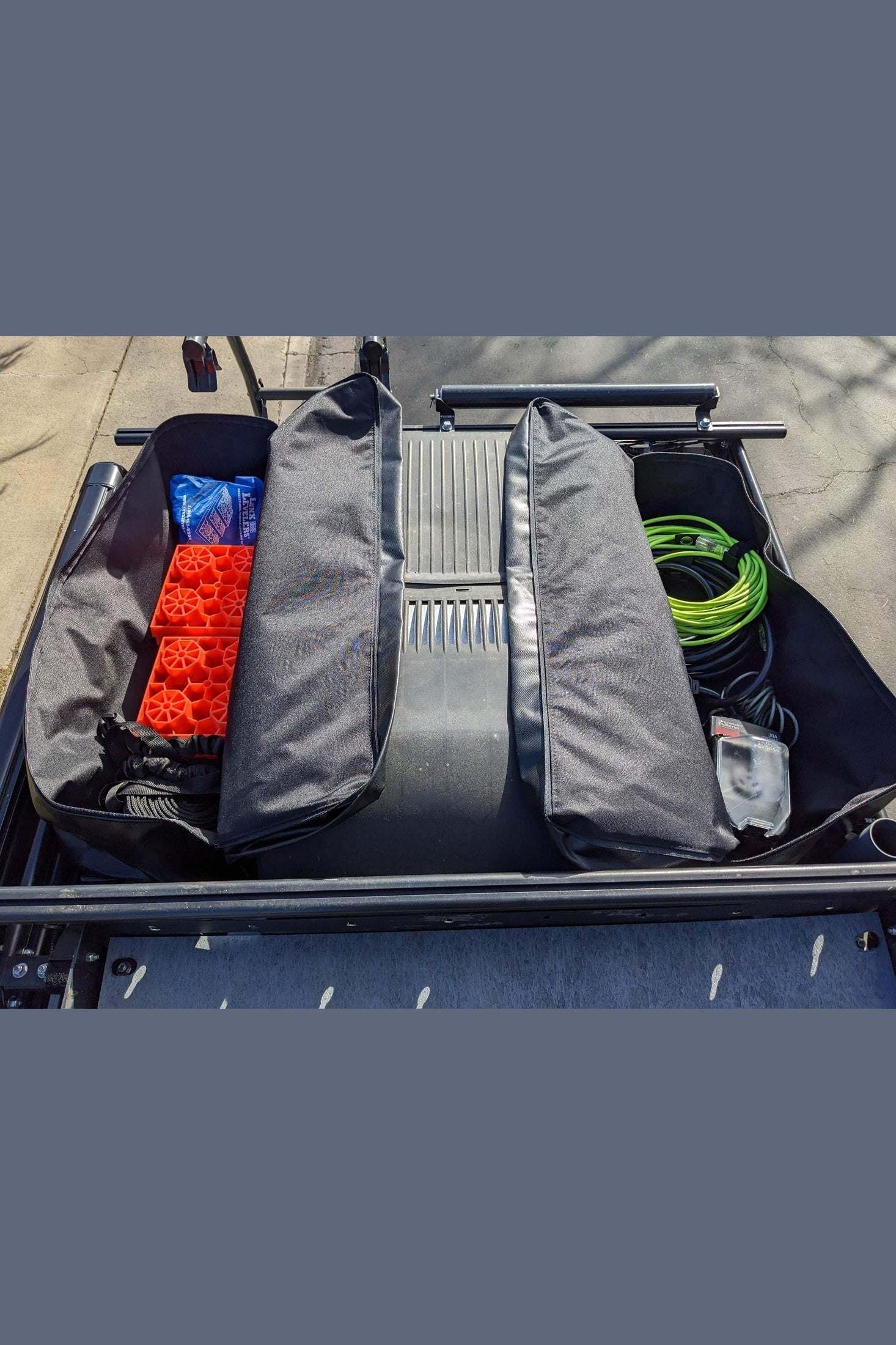 Winnebago Revel Roof Rack Bag with weather-resistant durable vinyl and spacious storage on van rooftop