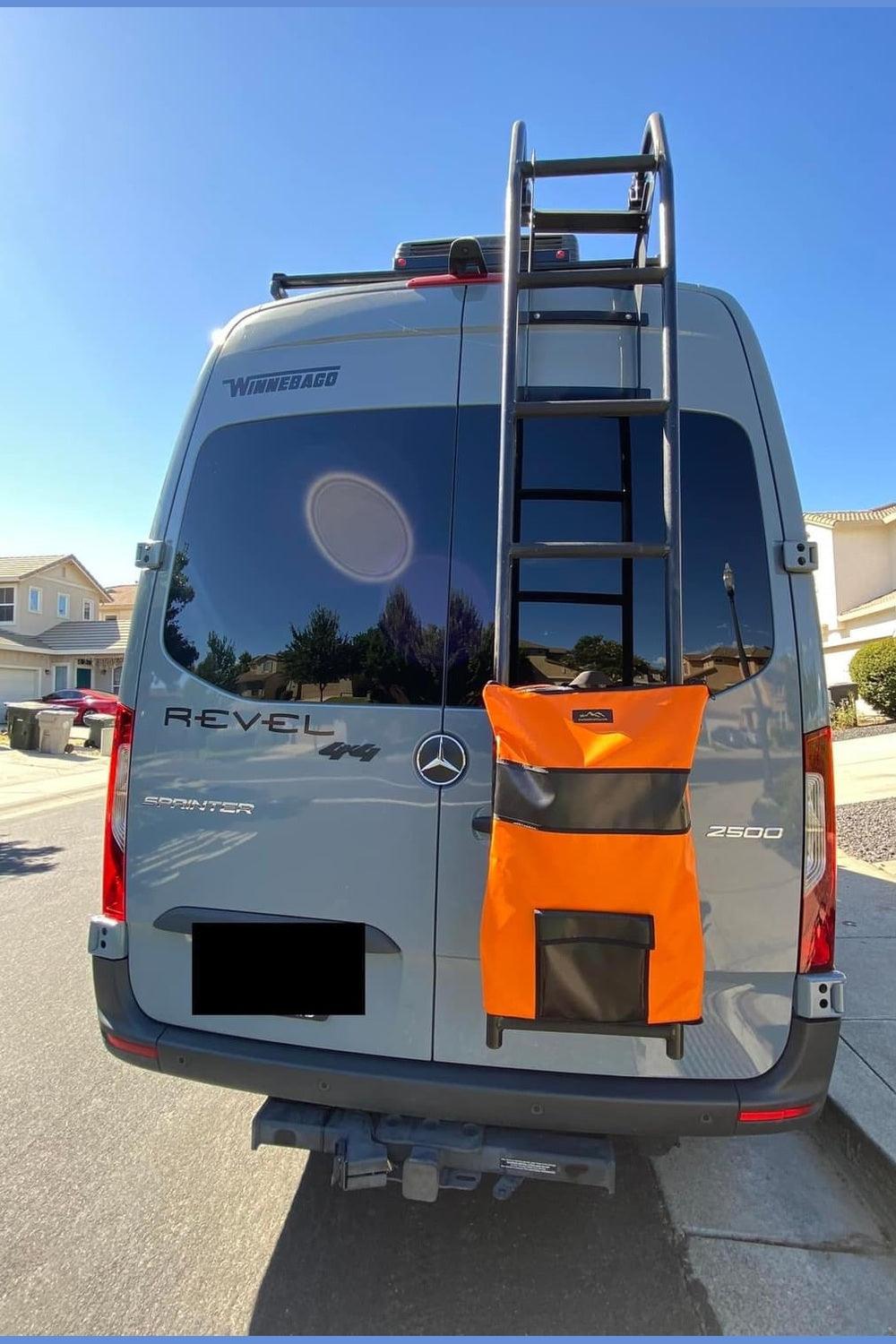 Ladder Trash Bag attached to van ladder for convenient storage.
