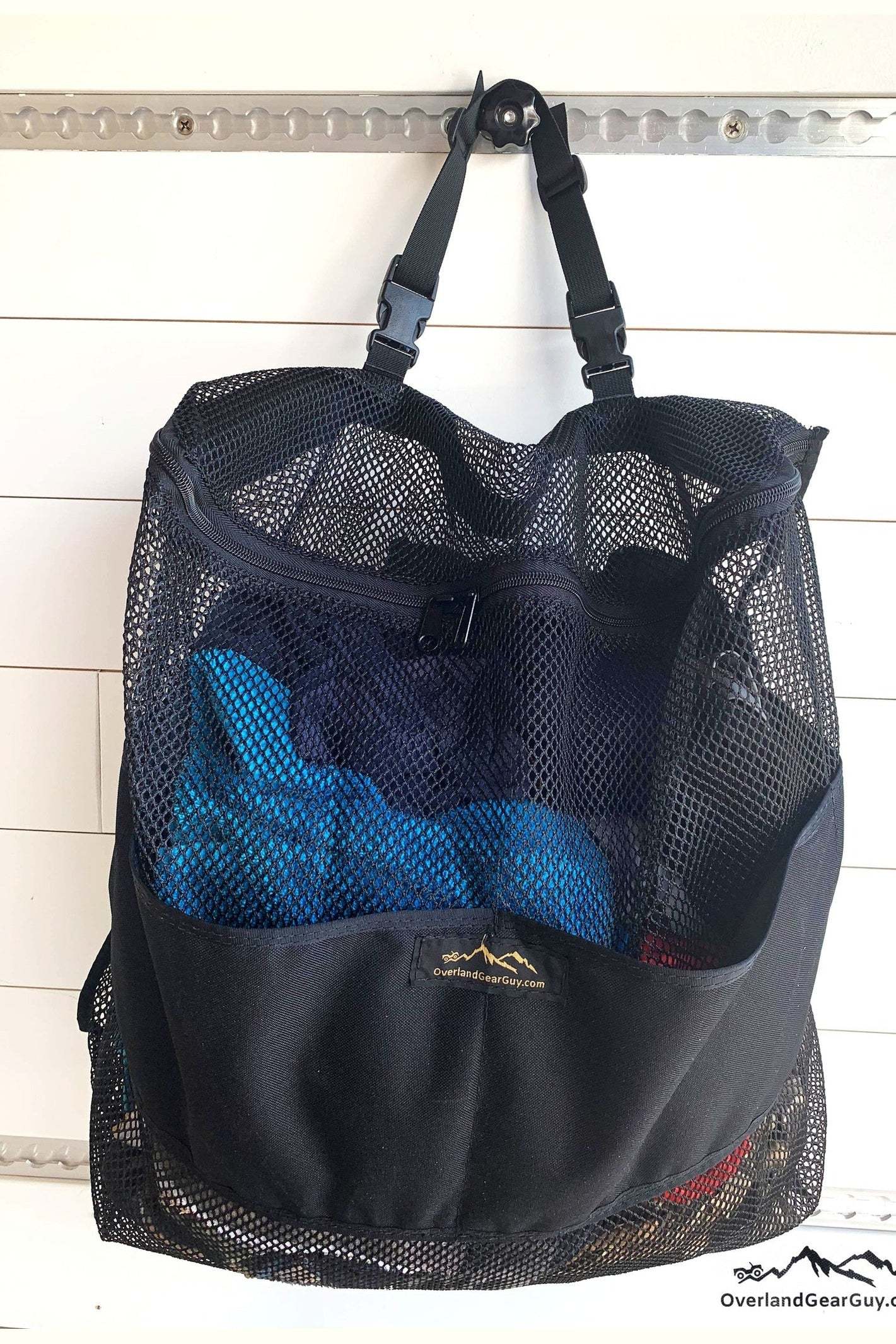Mesh Overland Laundry Bag hanging with black mesh and sturdy buckles for outdoor gear storage