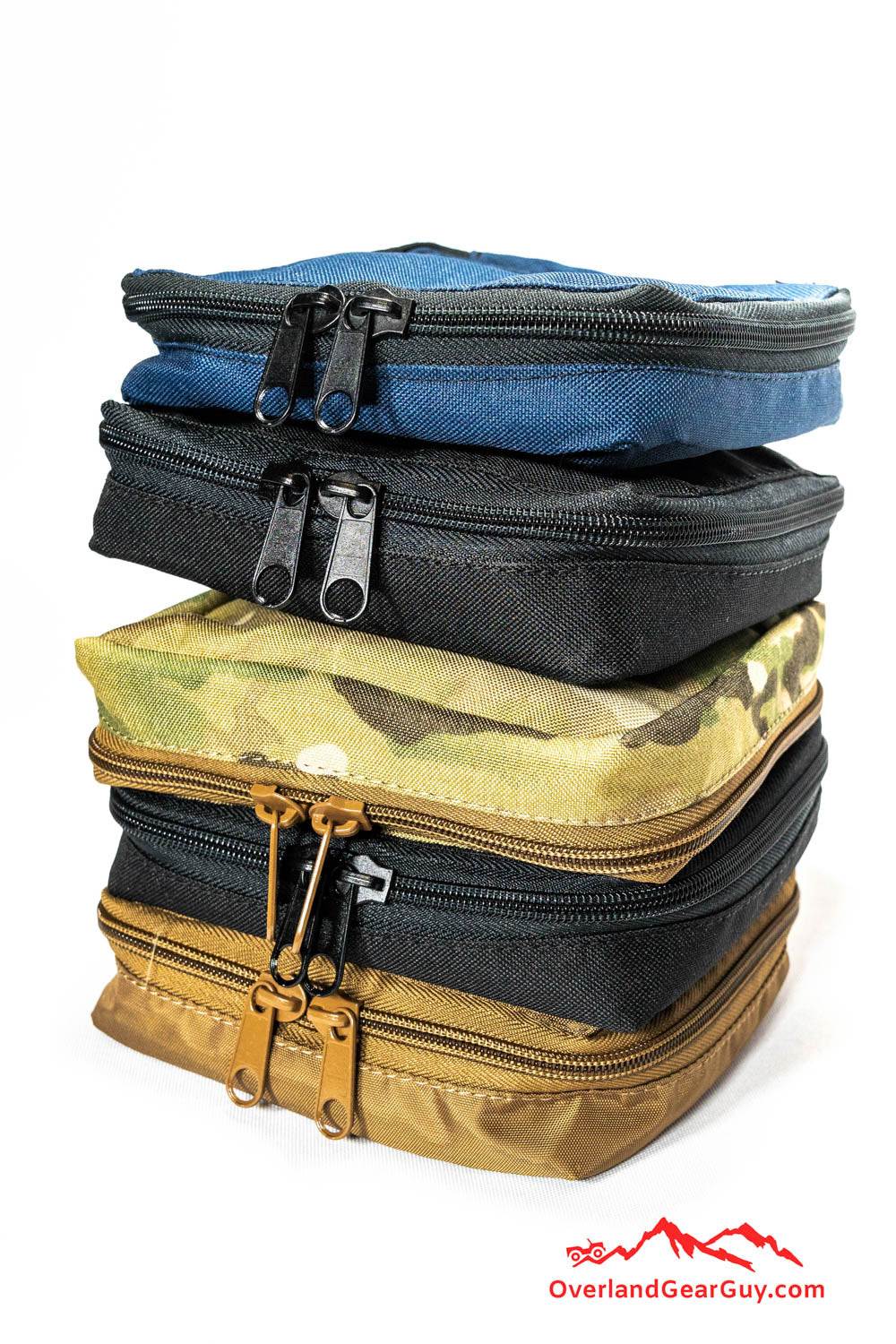 Stack of durable Emerald Organization Pouch in various colors with heavy-duty zippers and carrying handles