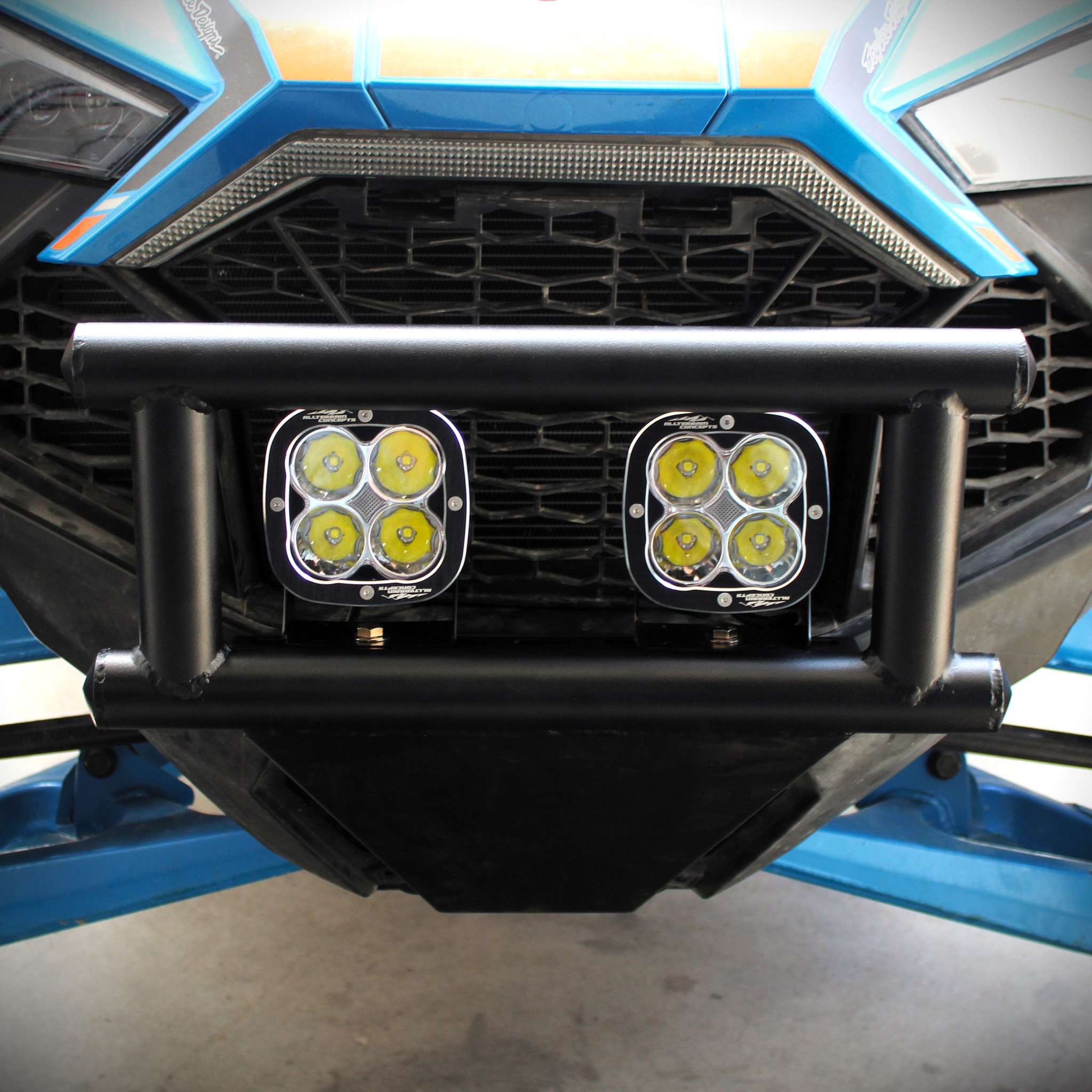 ATC Bumper Kit with dual LED pods installed on front of Polaris RZR Pro R in black powder-coated finish