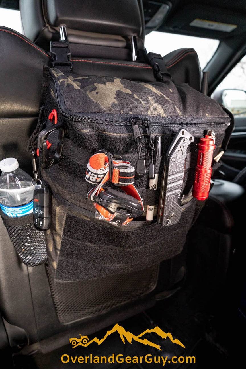 Sequoia Large Headrest Storage Bag attached to car seat with multiple compartments and MOLLE compatibility for vehicle organization
