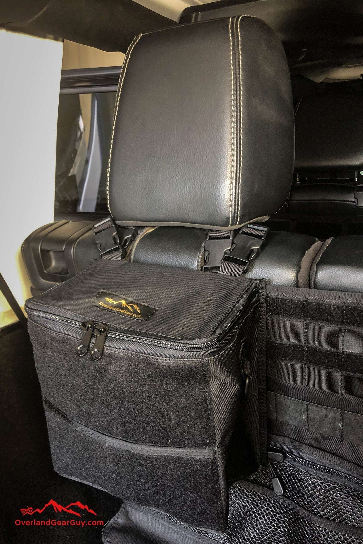 Sequoia Mini Headrest storage bag attached to vehicle headrest with front zipper and pockets for organizing essentials