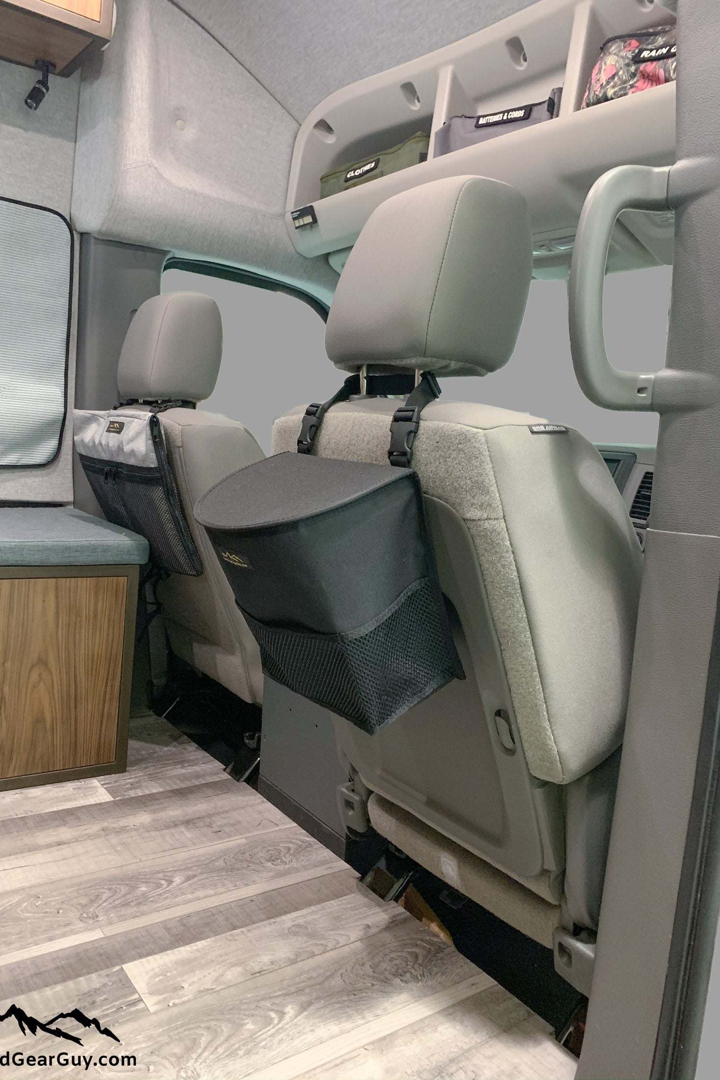 Compact headrest trash bag attached to vehicle seat for organized in-car waste disposal