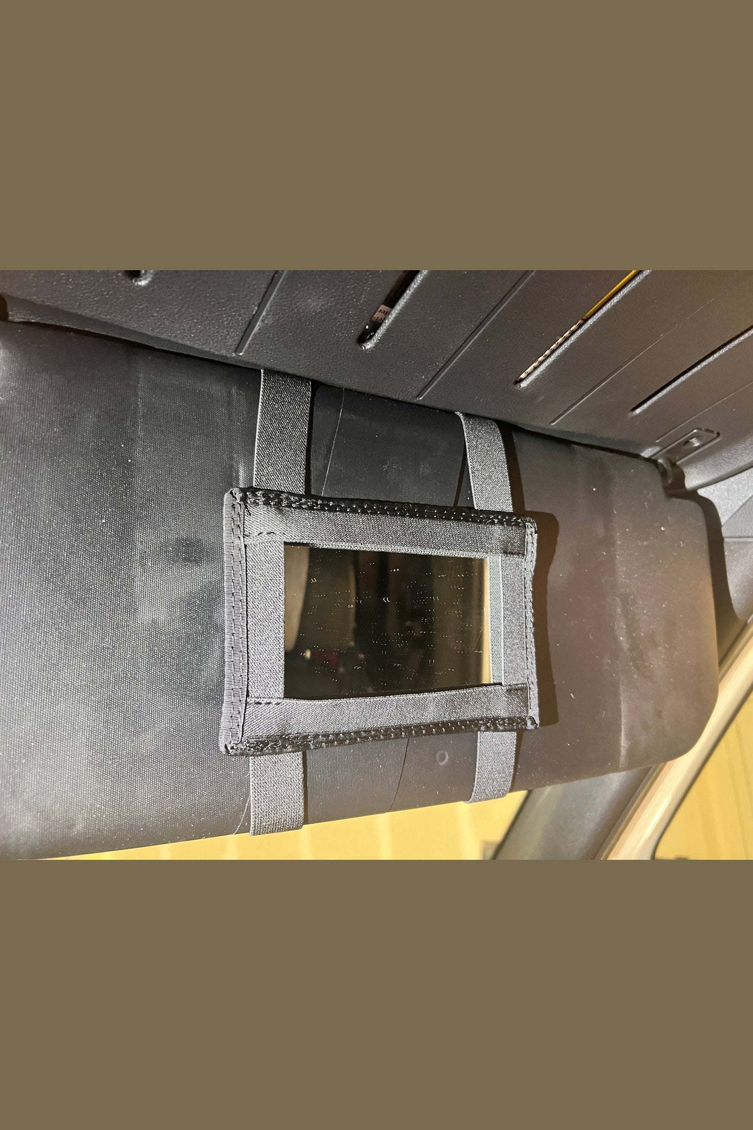 Sprinter Sun Visor Mirror Holder attached with elastic loops for organized and clutter-free rear-view mirror storage