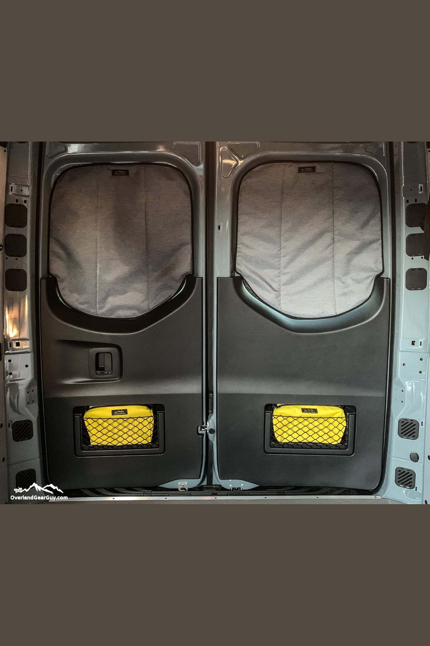 Yellow storage pouch attached to mesh door pocket of vehicle rear doors