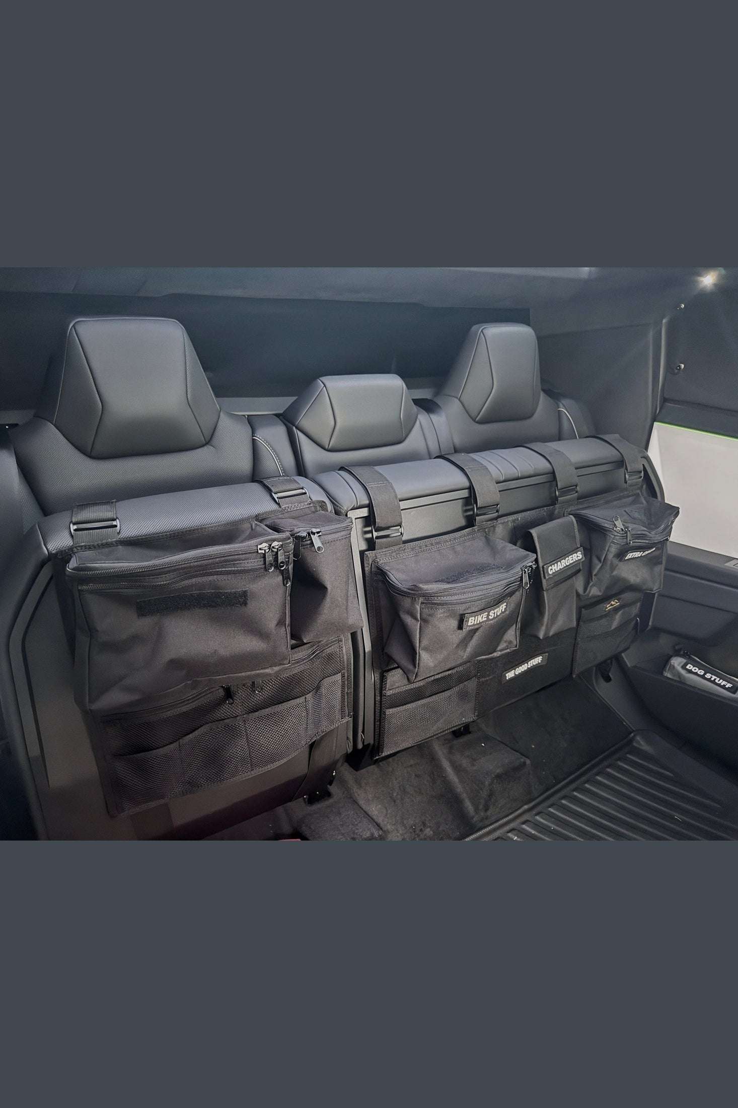 Tesla Cybertruck back seat black storage organizers with multiple pockets and secure velcro attachments