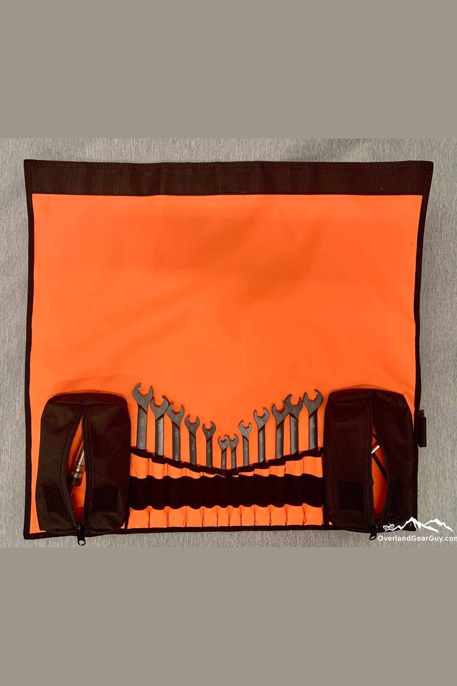 Orange Overland Tool Wrap with organized wrenches and zippered compartments for tool storage and transport