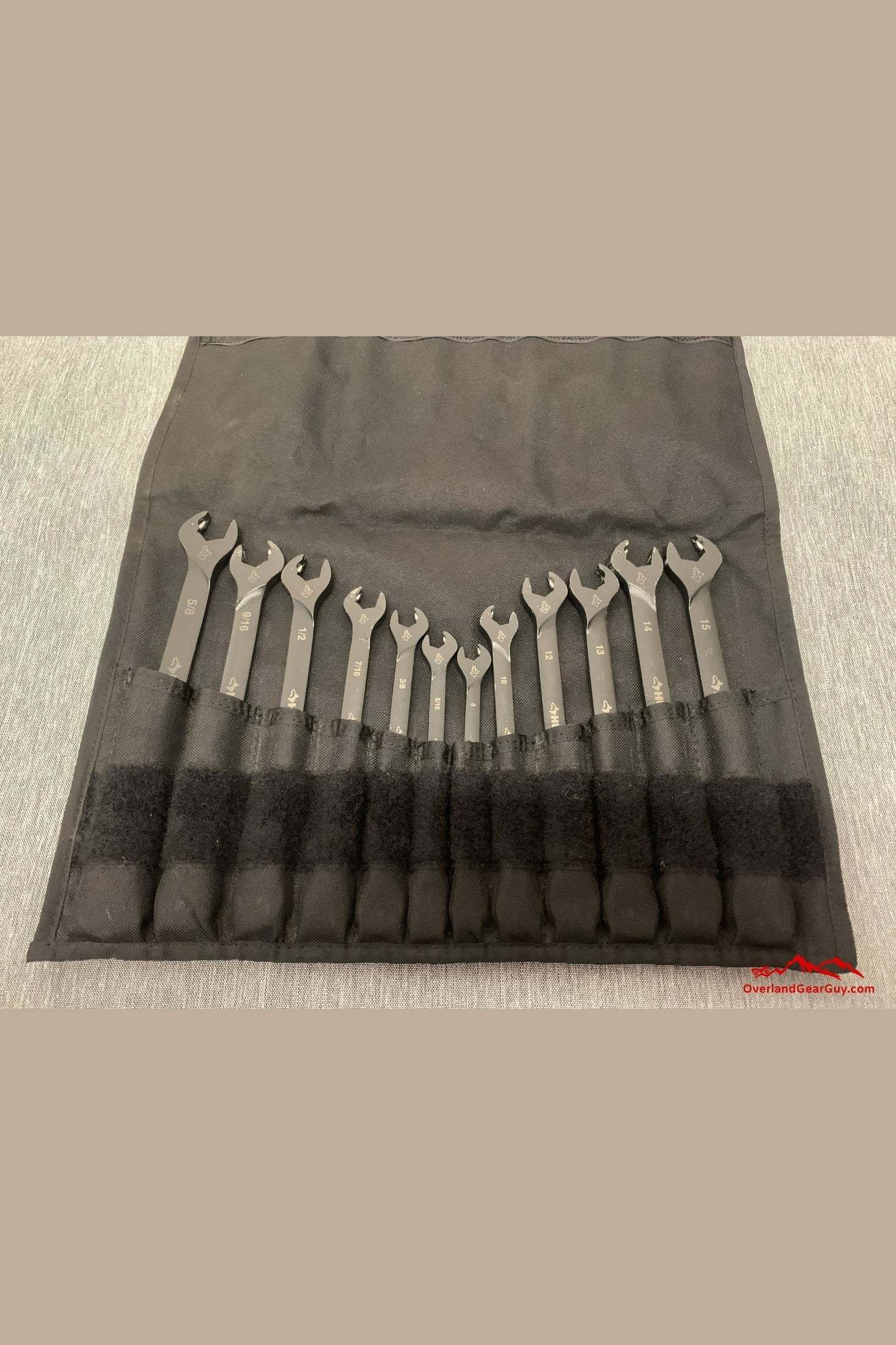Overland Wrench Wrap with multiple wrenches organized in a durable, compact black tool wrap
