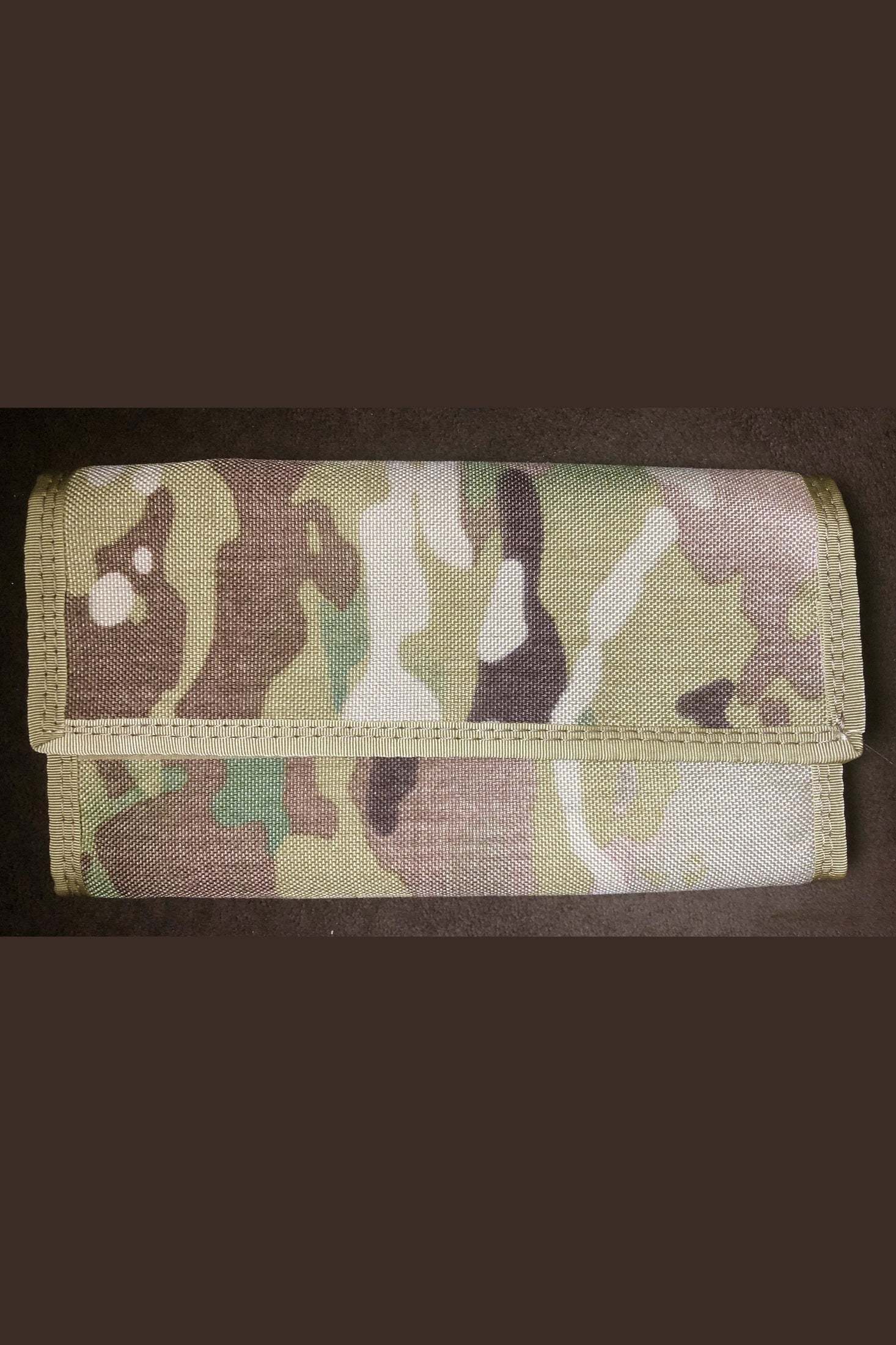 Compact camouflage cord organizer pouch for USB and HDMI cables with elastic loops