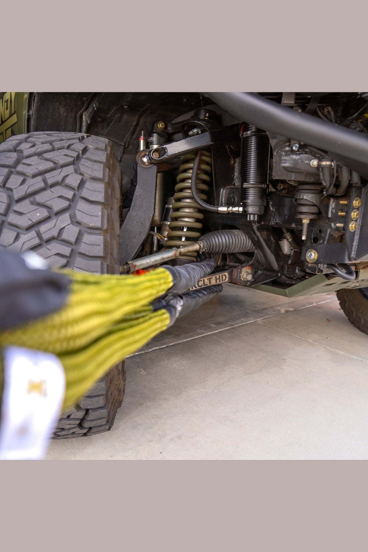 Hero Bridle used in off-road vehicle recovery, demonstrating metal-edge rated reinforcement and adaptability across recovery points.