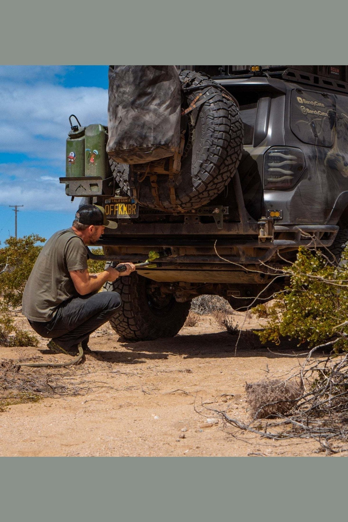 Off-road vehicle with Hitch Hero Soft Shackle in action.