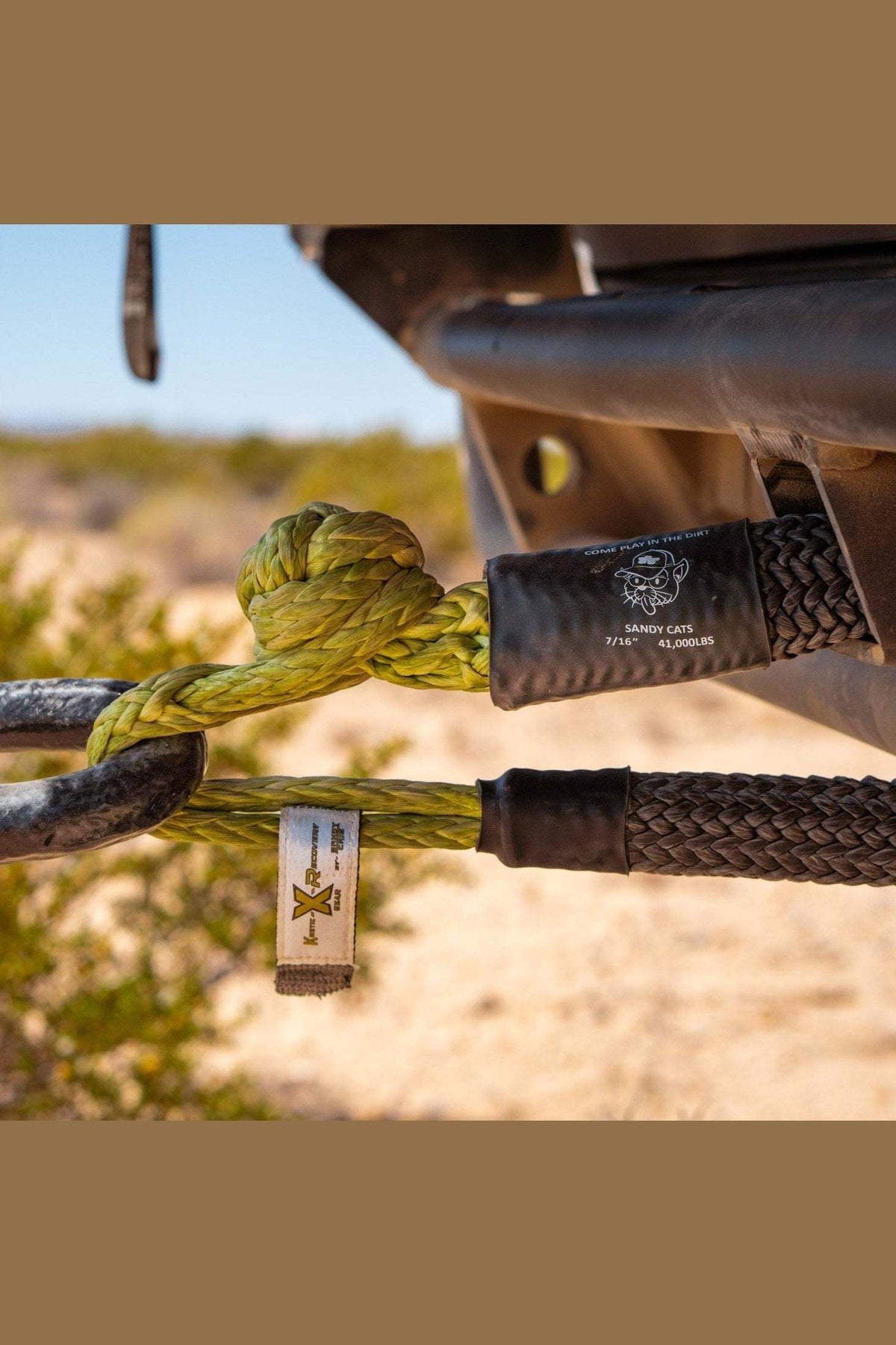Durable Hitch Hero Soft Shackle attached to a vehicle, designed for towing with ultra-high-molecular-weight polyethylene for strength and safety.