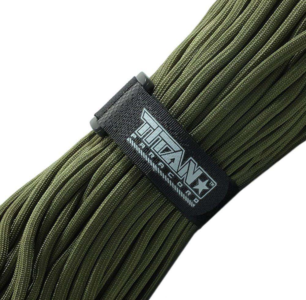 Paracord fasteners in black, hook and loop straps securing green paracord bundle.