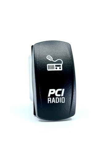 Rocker switch for PCI radios with amber LED backlight.