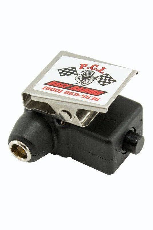 Helmet to Handheld PTT adapter with built-in push-to-talk button for off-road racing communications.