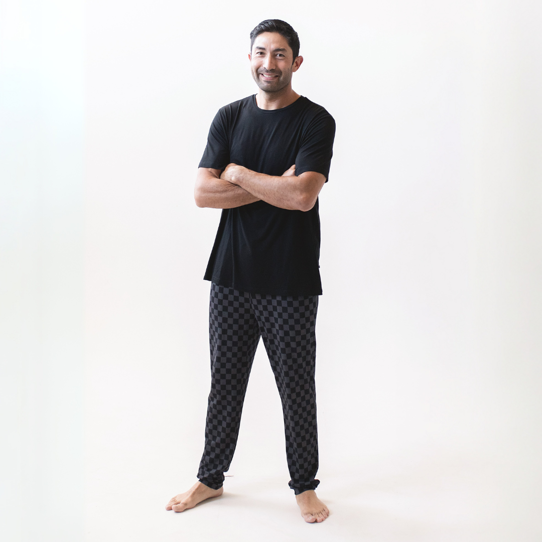 Men's crew neck pajamas set with short sleeve black top and checkered pants, relaxed fit and elastic waistband
