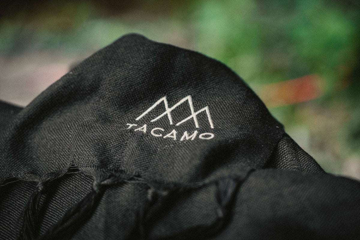 TACAMO Shemagh Desert Scarf in black with logo detailing.