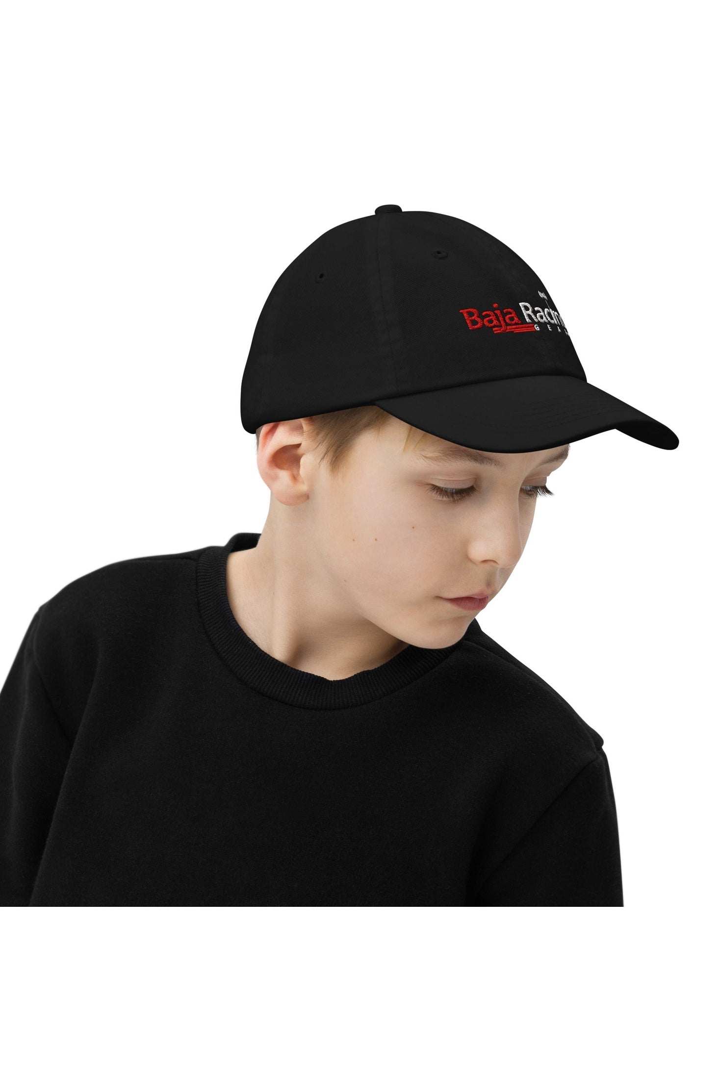 Baja Racing Gear Youth Baseball Cap on a young boy, featuring a black design with embroidered logo.