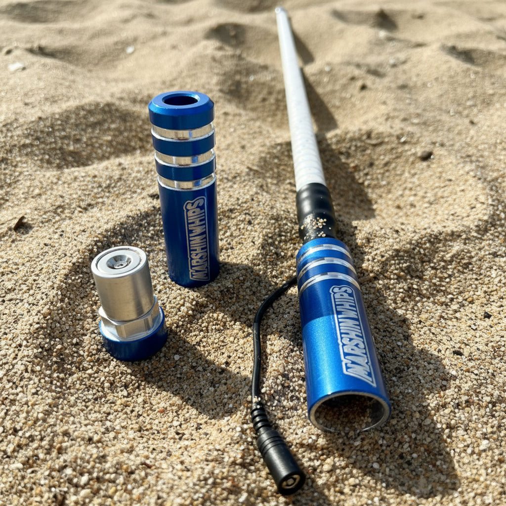 Game Changer Blue Off-Road Whip with magnetic base and LED lights on sand