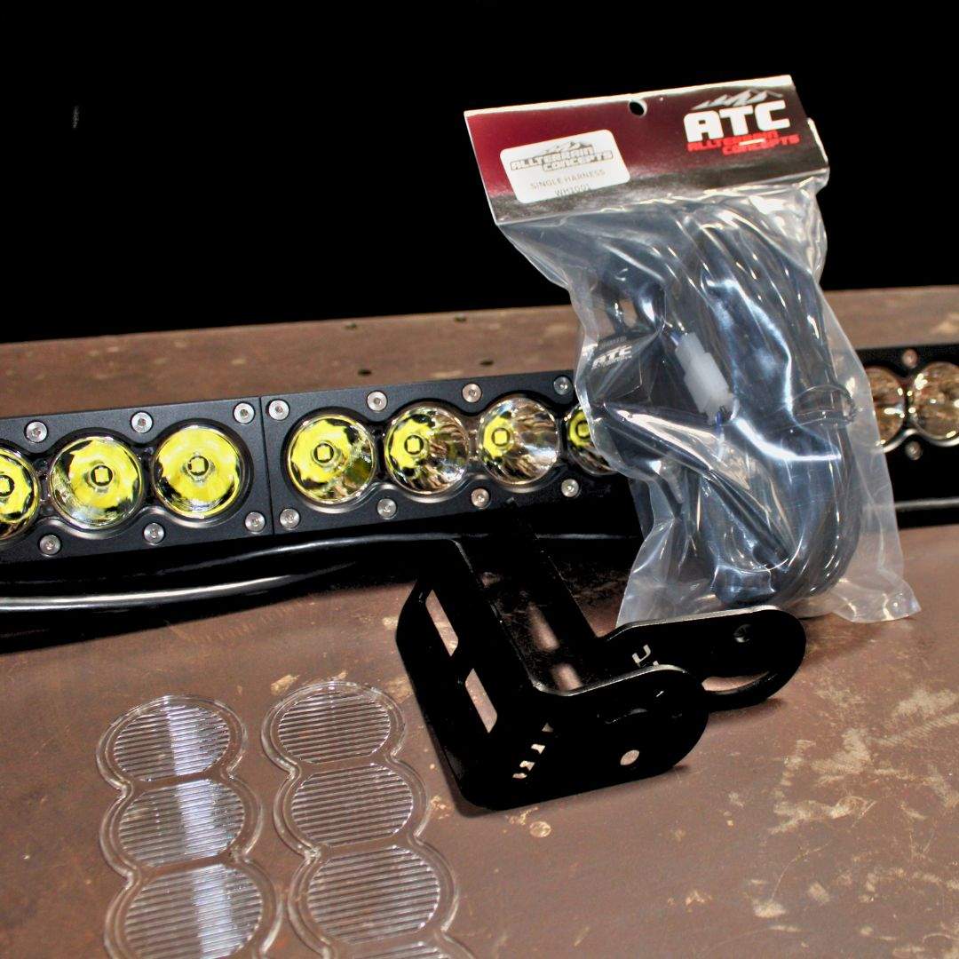 CF Moto Lighting Bundle with 43-inch LED light bar, wiring harness, and universal mounting brackets for off-road vehicles